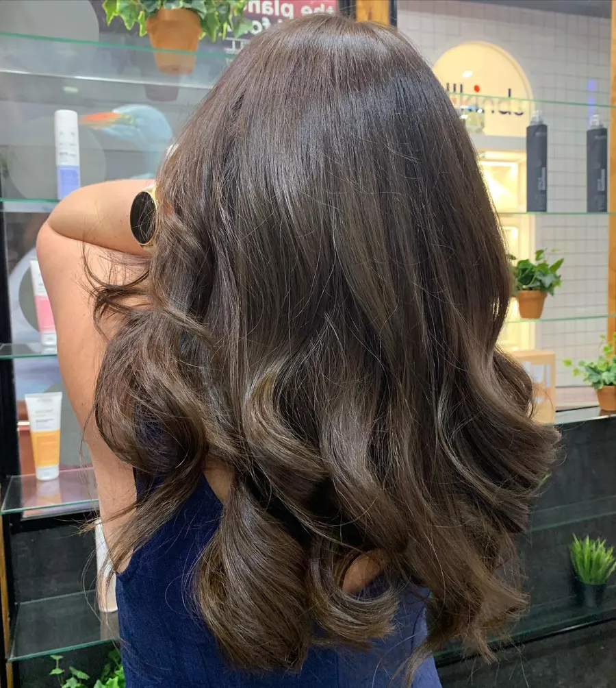 A smooth, high-gloss brunette finish, by Roi Hair